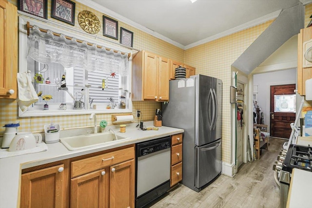 kitchen featuring appliances with stainless steel finishes, backsplash, ornamental molding, sink, and light hardwood / wood-style flooring