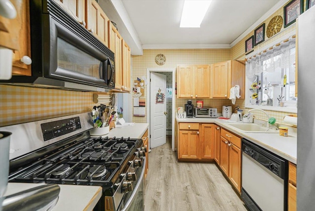 kitchen with ornamental molding, sink, light hardwood / wood-style flooring, dishwasher, and stainless steel range with gas stovetop