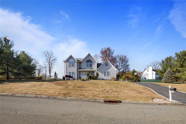 front facade with a front lawn