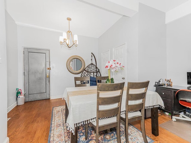 5601 Riverdale Ave Unit 1C, Bronx, NY 10471 - dining space with a chandelier, wood finished floors, and baseboards