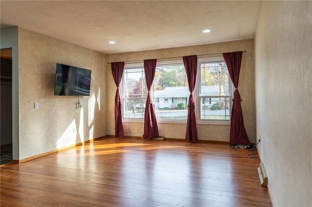 empty room featuring light hardwood / wood-style flooring