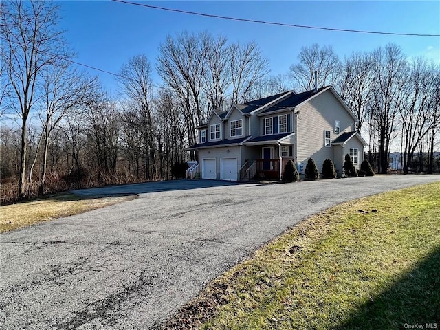 view of side of home with a garage