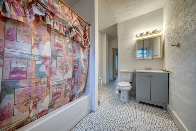 full bathroom featuring vanity, shower / bath combination with curtain, and toilet