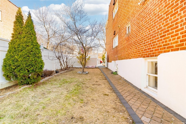 view of yard featuring a fenced backyard