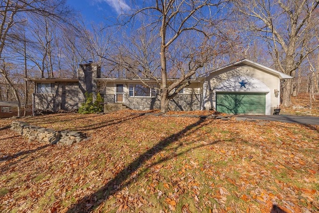 single story home with a garage