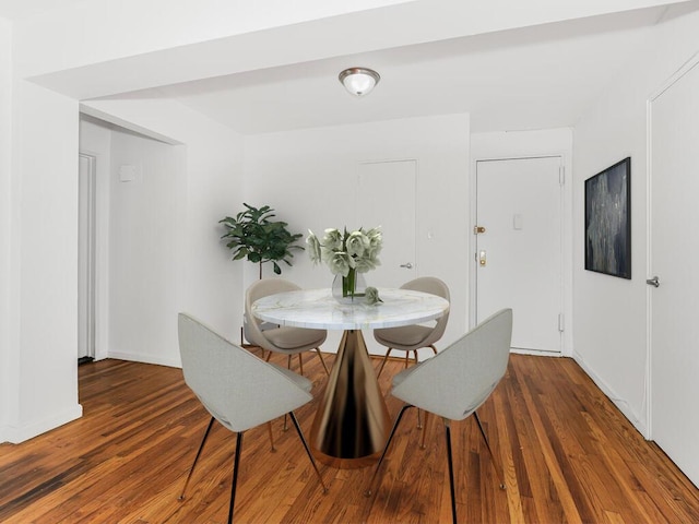 dining area featuring hardwood / wood-style floors