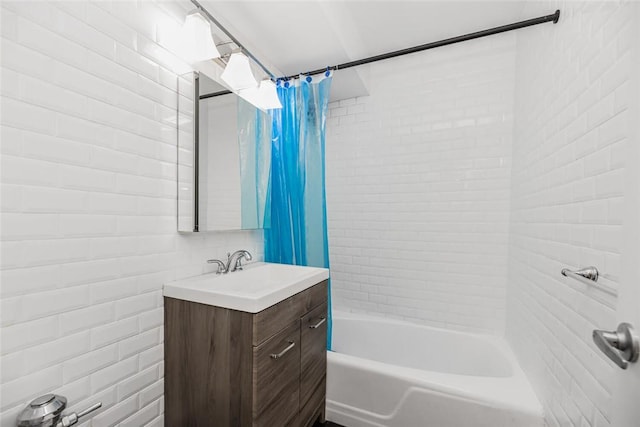 bathroom featuring shower / bath combination with curtain and vanity