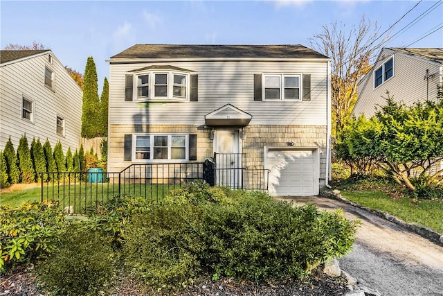 view of front of home with a garage