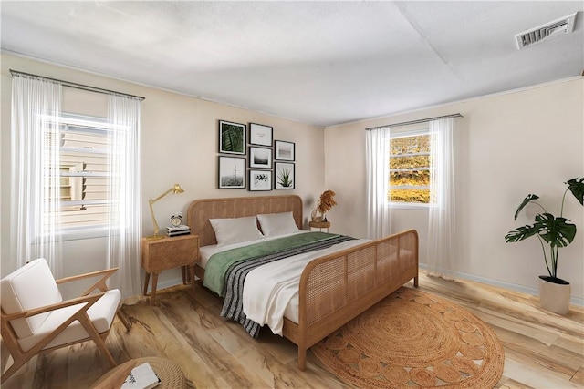 bedroom featuring light hardwood / wood-style floors