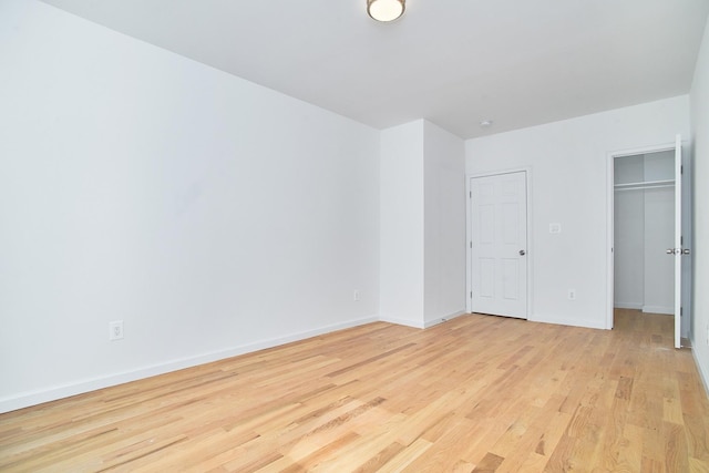 unfurnished bedroom with light hardwood / wood-style floors