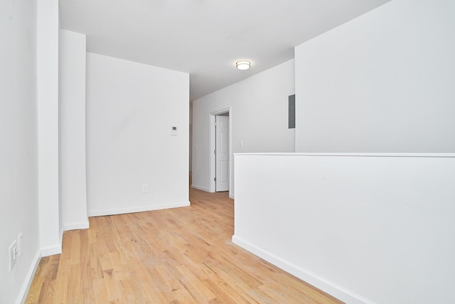 spare room with light hardwood / wood-style flooring