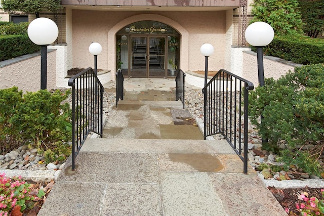 property entrance featuring french doors