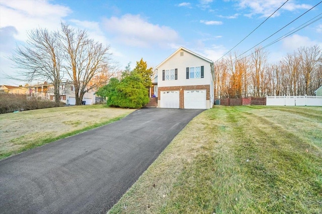 exterior space with a yard and a garage