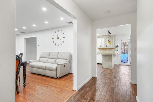 hall featuring light wood-type flooring