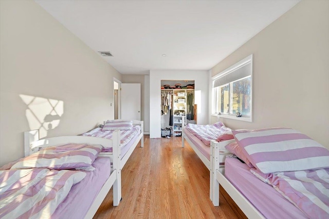 bedroom featuring light wood-type flooring