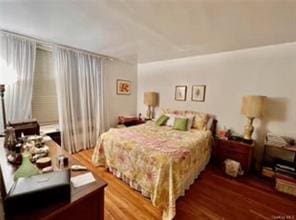 836 Tilden St Unit 6K, Bronx, NY 10467 - bedroom featuring wood finished floors