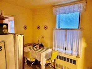 836 Tilden St Unit 6K, Bronx, NY 10467 - bedroom with radiator heating unit
