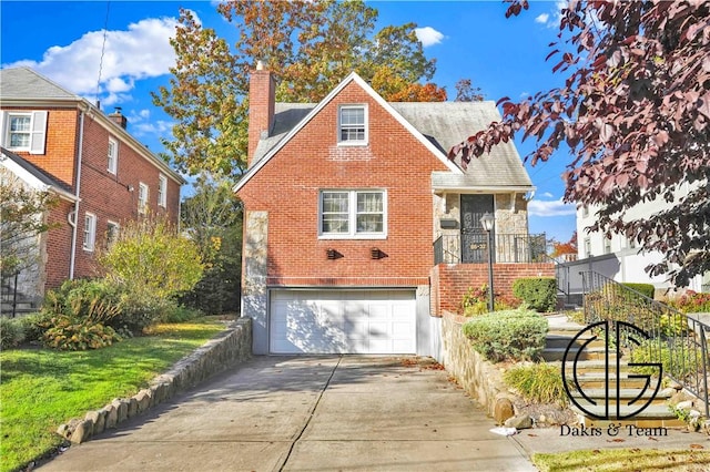 view of front of property with a garage