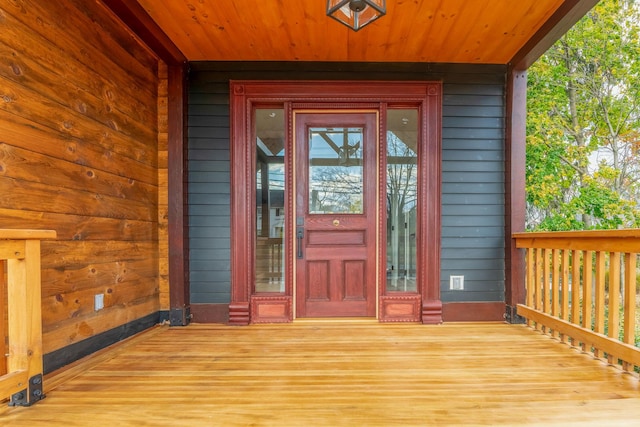 doorway to property featuring a porch