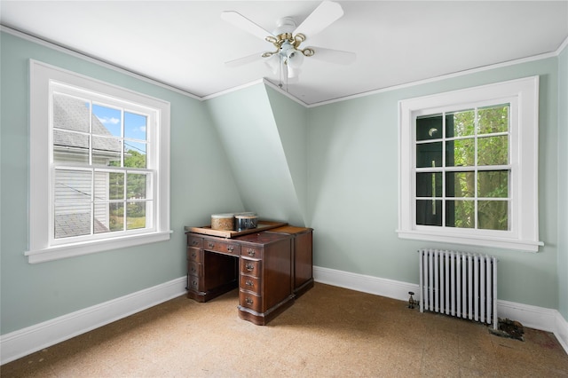 office space with radiator, ceiling fan, baseboards, and ornamental molding