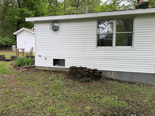 3 Brookside Trl, Monroe, NY 10950 - view of side of property featuring a storage shed and an outdoor structure