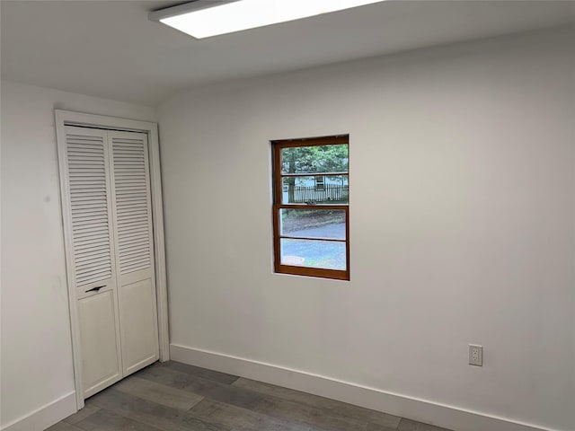 3 Brookside Trl, Monroe, NY 10950 - unfurnished bedroom with dark wood-style flooring, baseboards, and a closet