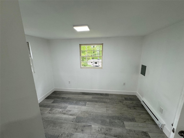 3 Brookside Trl, Monroe, NY 10950 - unfurnished room featuring a baseboard radiator, wood finished floors, and baseboards