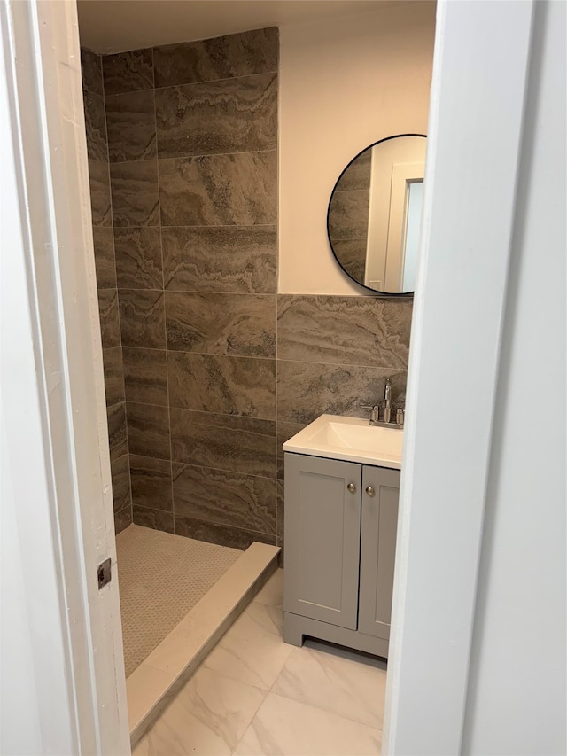 3 Brookside Trl, Monroe, NY 10950 - full bath with marble finish floors, vanity, a shower stall, and tile walls