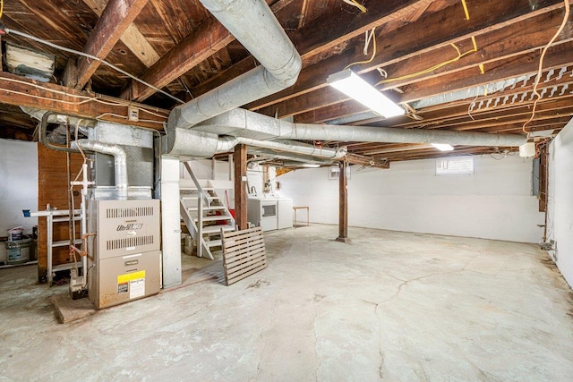 basement featuring separate washer and dryer