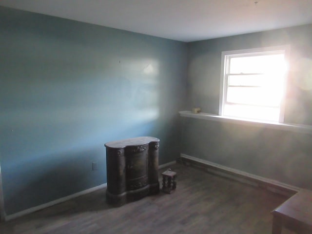 unfurnished room featuring dark hardwood / wood-style floors