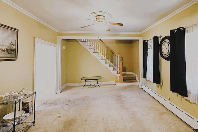 entryway with carpet floors, a baseboard radiator, ceiling fan, and ornamental molding