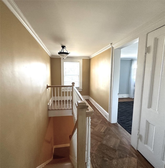 staircase with parquet floors and ornamental molding