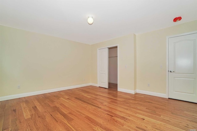 unfurnished bedroom with light hardwood / wood-style floors