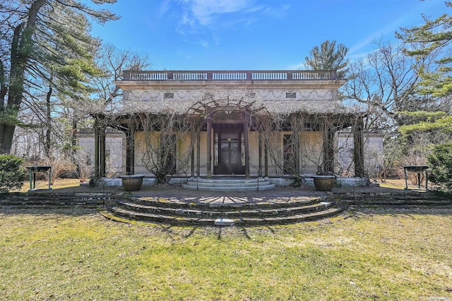 exterior space with a front yard