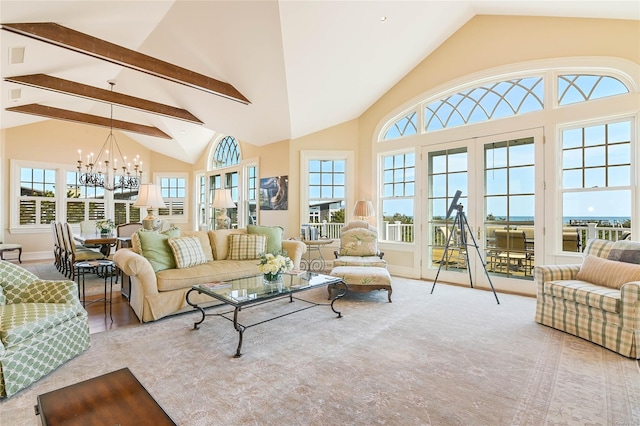 living room with french doors, a chandelier, high vaulted ceiling, and beamed ceiling