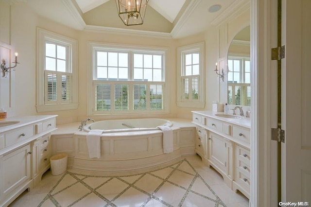 bathroom featuring a tub to relax in, lofted ceiling, crown molding, vanity, and a notable chandelier