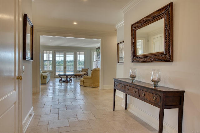 hallway featuring crown molding and french doors