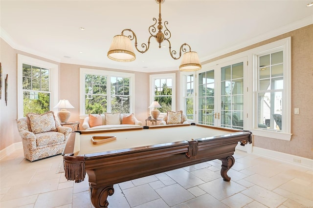 recreation room featuring french doors, pool table, and crown molding