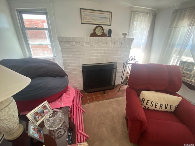 living room featuring a fireplace and tile patterned floors