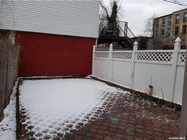 view of snow covered patio