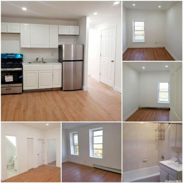 kitchen with appliances with stainless steel finishes, white cabinetry, and a healthy amount of sunlight