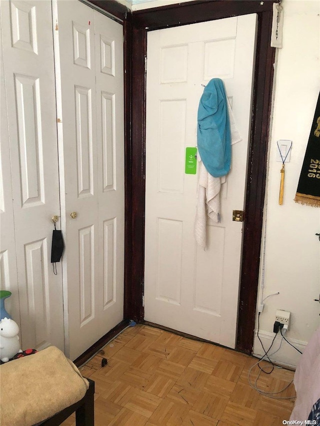 entryway featuring light parquet floors