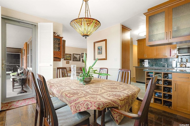 dining area featuring sink