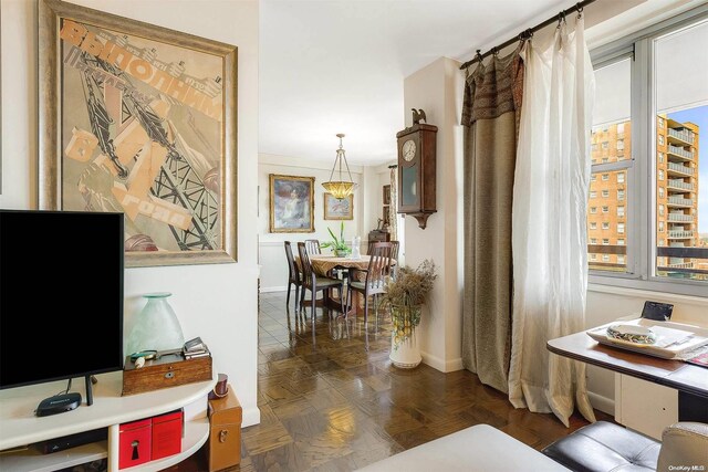 interior space featuring dark parquet flooring