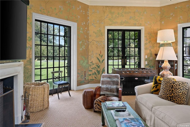 living room featuring carpet and crown molding