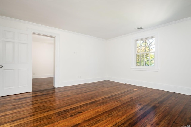 unfurnished room with dark wood-type flooring and ornamental molding