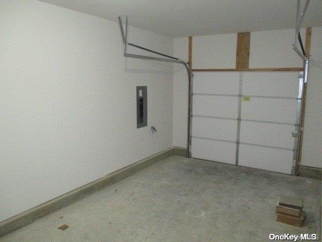 garage with electric panel