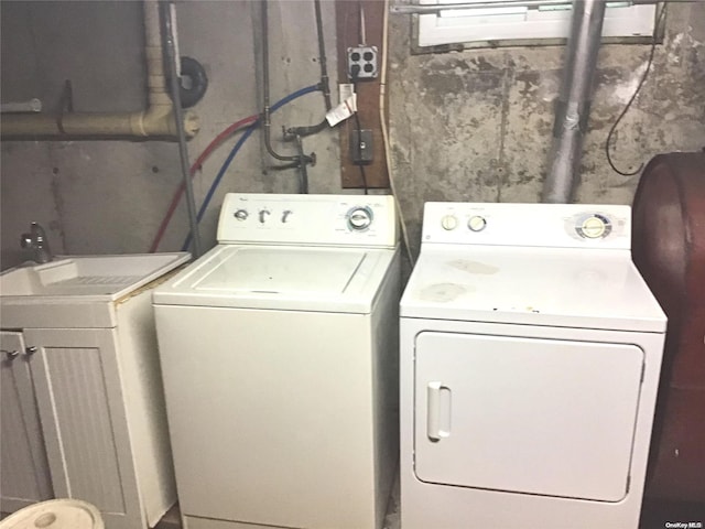 clothes washing area with independent washer and dryer