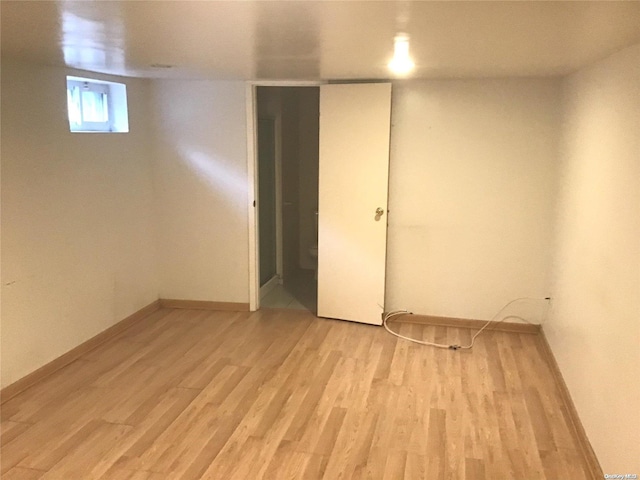 basement with light wood-type flooring