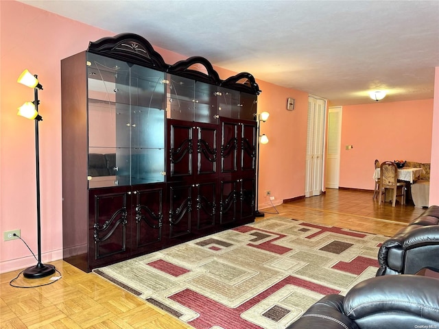 living room with parquet floors